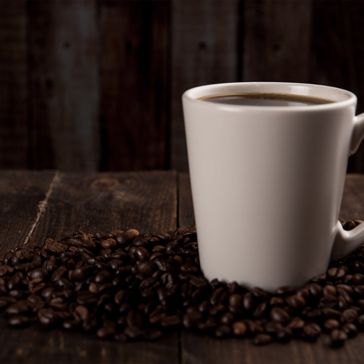 cup of coffee and coffee beans