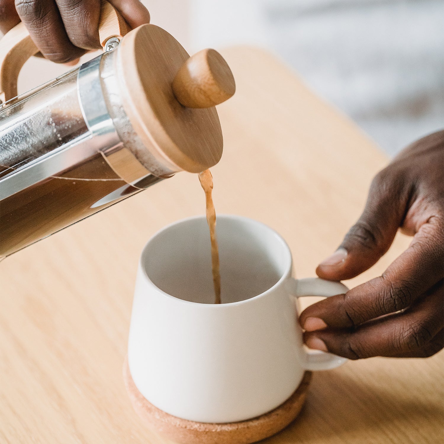 french press coffee poured into cup